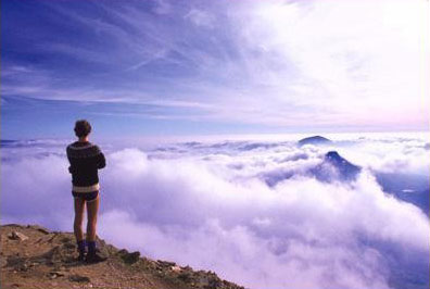 Man overlooking mountain